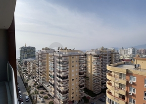 شقة مفروشة - غرفة نوم وصالة - ضمن مجمع قريب من البحر والخدمات - الانيا / مهموتلار 