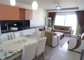 شقة مفروشة - غرفة نوم وصالة - ضمن مجمع قريب من البحر والخدمات - الانيا / مهموتلار 