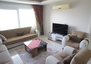 شقة مفروشة - غرفة نوم وصالة - ضمن مجمع قريب من البحر والخدمات - الانيا / مهموتلار 