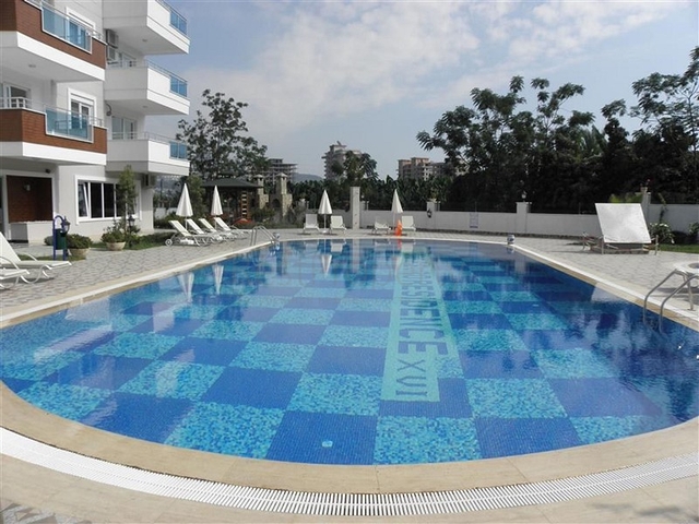 طابق مرتفع -اطلالة بحر - شقة غرفة وصالة -مفروشة وضمن مجمع سكني / مهموتلار / الانيا 