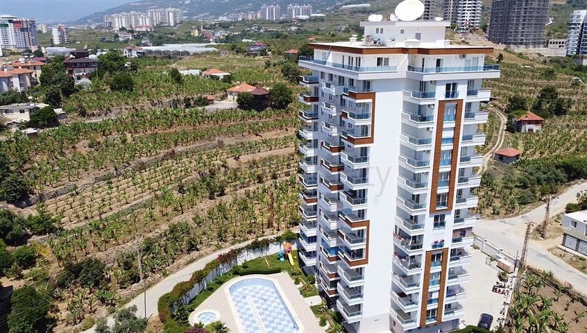 طابق مرتفع -اطلالة بحر - شقة غرفة وصالة -مفروشة وضمن مجمع سكني / مهموتلار / الانيا 