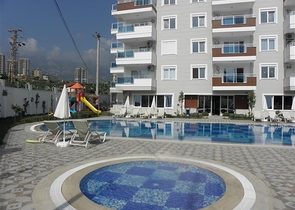 طابق مرتفع -اطلالة بحر - شقة غرفة وصالة -مفروشة وضمن مجمع سكني / مهموتلار / الانيا 