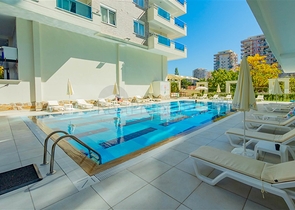 شقة اطلالة بحر في محمودلار - تصميم 1+1 - ضمن مجمع فاخر -محمودلار / الانيا 