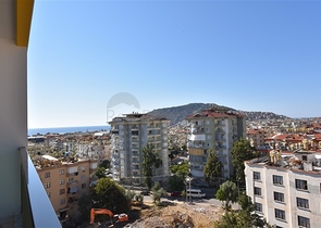 اطلالة بحر وقلعة - شقة غرفتين وصالة ضمن مجمع فاخر - في مركز الانيا