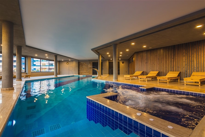 شقة اطلالة بحر - ضمن مجمع 5 نجوم - تصميم 1+2 - في كارجيجاك / الانيا 