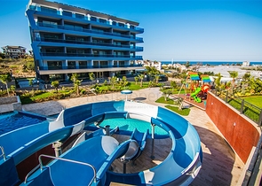 شقة اطلالة بحر - ضمن مجمع 5 نجوم - تصميم 1+2 - في كارجيجاك / الانيا 