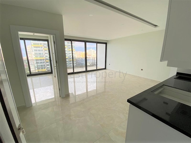 شقق اطلالة بحر في الانيا - تصميم 1+1 - مجمع فاخر -في محمودلار / الانيا 