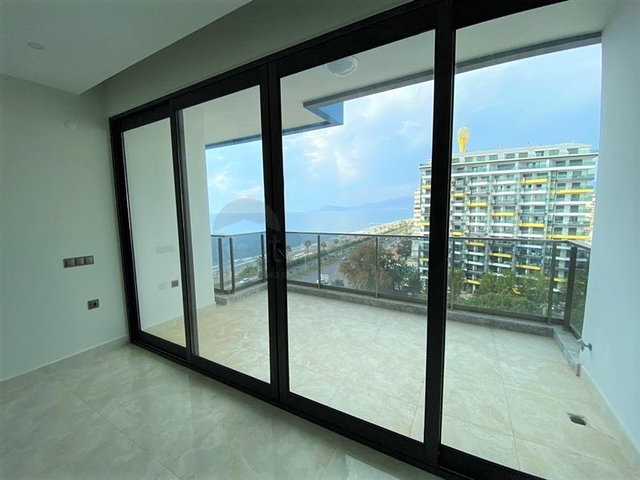 شقق اطلالة بحر في الانيا - تصميم 1+1 - مجمع فاخر -في محمودلار / الانيا 