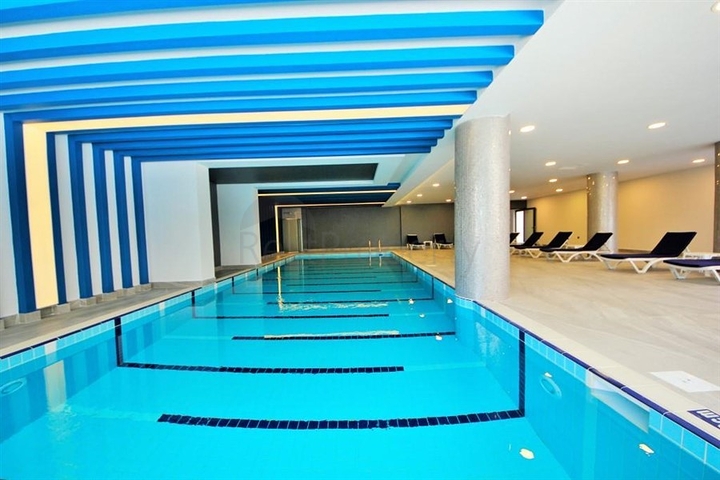 شقق اطلالة بحر في الانيا - تصميم 1+1 - مجمع فاخر -في محمودلار / الانيا 