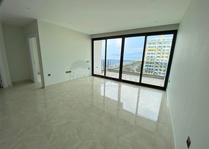 شقق اطلالة بحر في الانيا - تصميم 1+1 - مجمع فاخر -في محمودلار / الانيا 