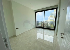 شقق اطلالة بحر في الانيا - تصميم 1+1 - مجمع فاخر -في محمودلار / الانيا 