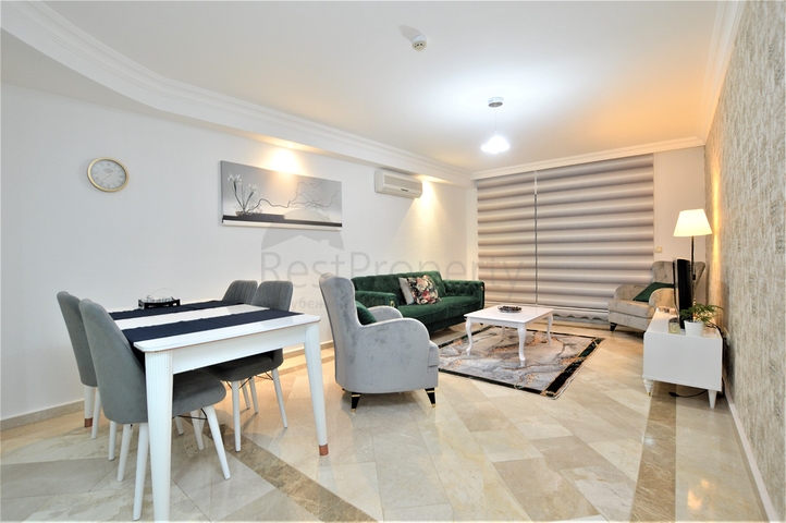 مجمع يضم كافة الخدمات -شقة غرفتين وصالة مفروشة -في محمودلار / الانيا 