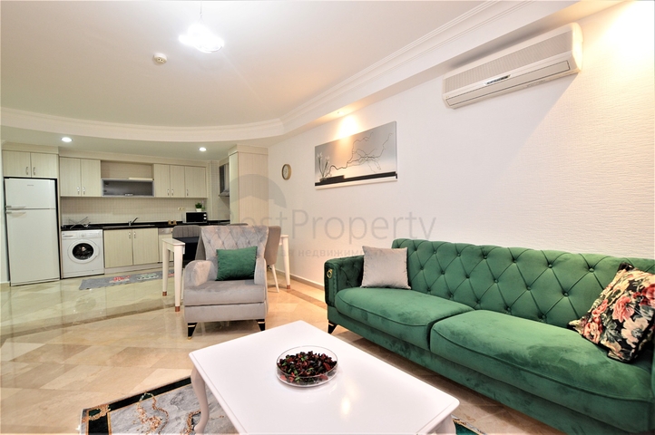 مجمع يضم كافة الخدمات -شقة غرفتين وصالة مفروشة -في محمودلار / الانيا 