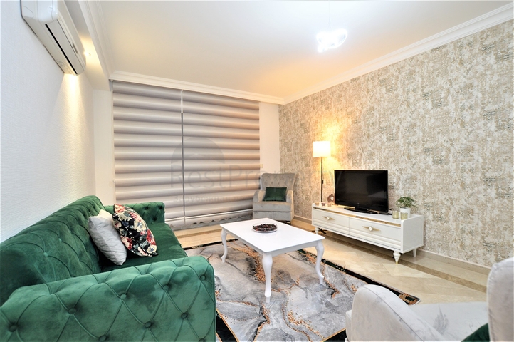 مجمع يضم كافة الخدمات -شقة غرفتين وصالة مفروشة -في محمودلار / الانيا 