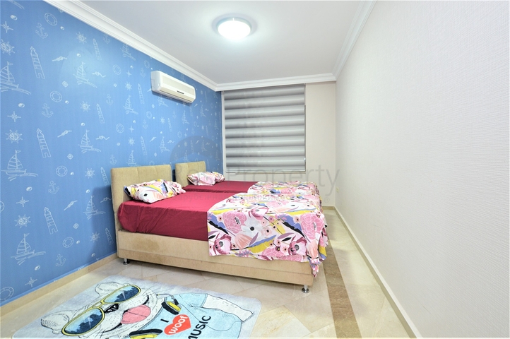 مجمع يضم كافة الخدمات -شقة غرفتين وصالة مفروشة -في محمودلار / الانيا 