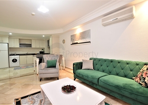 مجمع يضم كافة الخدمات -شقة غرفتين وصالة مفروشة -في محمودلار / الانيا 