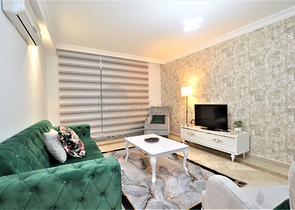 مجمع يضم كافة الخدمات -شقة غرفتين وصالة مفروشة -في محمودلار / الانيا 