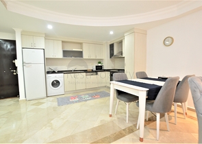 مجمع يضم كافة الخدمات -شقة غرفتين وصالة مفروشة -في محمودلار / الانيا 