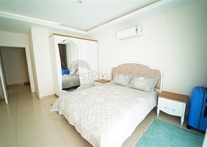 شقة واسعة غرفة وصالة -ضمن مجمع يضم خدمات -في محمودلار / الانيا