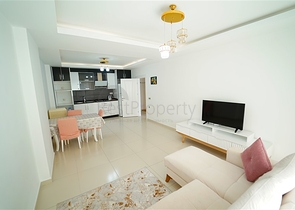 شقة واسعة غرفة وصالة -ضمن مجمع يضم خدمات -في محمودلار / الانيا