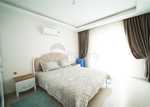 شقة واسعة غرفة وصالة -ضمن مجمع يضم خدمات -في محمودلار / الانيا