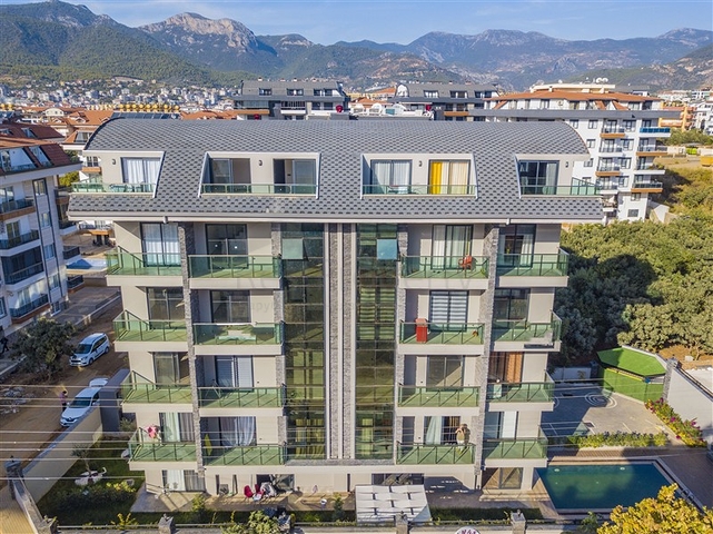 عقارات للبيع في اوبا - دوبلكس 2 غرفة وصالة -مفروشة -مجمع حديث -في اوبا / الانيا 