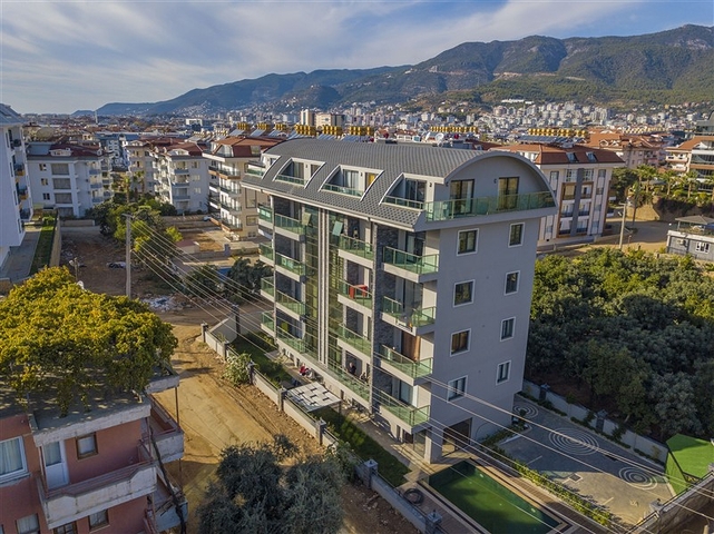 عقارات للبيع في اوبا - دوبلكس 2 غرفة وصالة -مفروشة -مجمع حديث -في اوبا / الانيا 