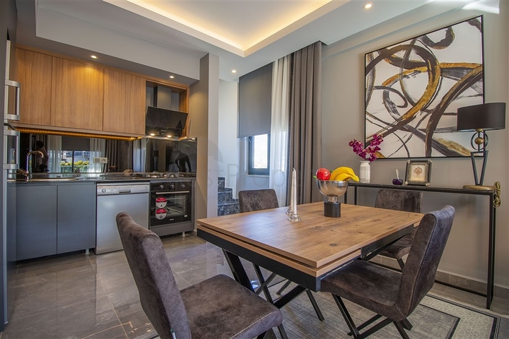 عقارات للبيع في اوبا - دوبلكس 2 غرفة وصالة -مفروشة -مجمع حديث -في اوبا / الانيا 