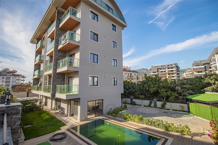 عقارات للبيع في اوبا - دوبلكس 2 غرفة وصالة -مفروشة -مجمع حديث -في اوبا / الانيا 