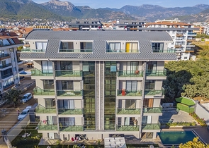 عقارات للبيع في اوبا - دوبلكس 2 غرفة وصالة -مفروشة -مجمع حديث -في اوبا / الانيا 