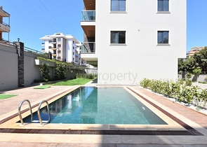 عقارات للبيع في اوبا - دوبلكس 2 غرفة وصالة -مفروشة -مجمع حديث -في اوبا / الانيا 