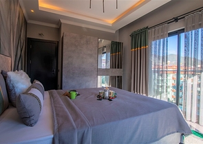 عقارات للبيع في اوبا - دوبلكس 2 غرفة وصالة -مفروشة -مجمع حديث -في اوبا / الانيا 