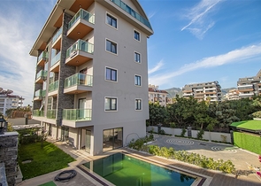 عقارات للبيع في اوبا - دوبلكس 2 غرفة وصالة -مفروشة -مجمع حديث -في اوبا / الانيا 