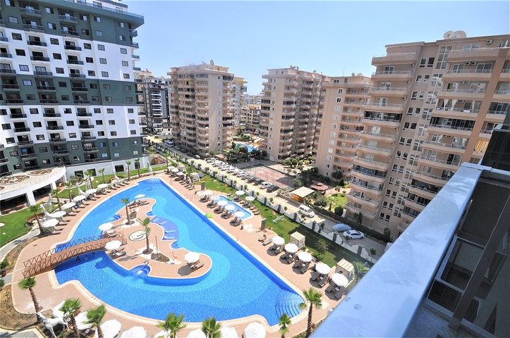 شقة ضمن مجمع بخدمات فاخرة -في الانيا / محمودلار 