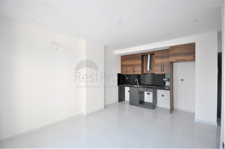 شقة ضمن مجمع بخدمات فاخرة -في الانيا / محمودلار 