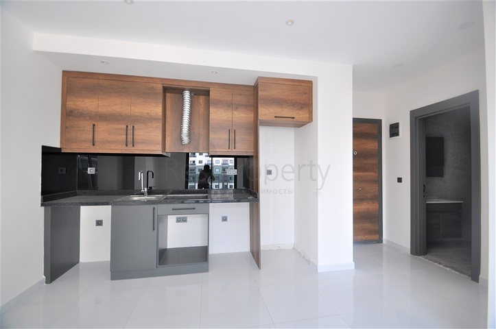 شقة ضمن مجمع بخدمات فاخرة -في الانيا / محمودلار 