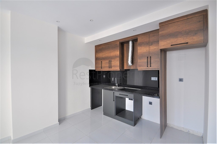 شقة ضمن مجمع بخدمات فاخرة -في الانيا / محمودلار 