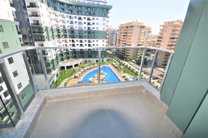 شقة ضمن مجمع بخدمات فاخرة -في الانيا / محمودلار 