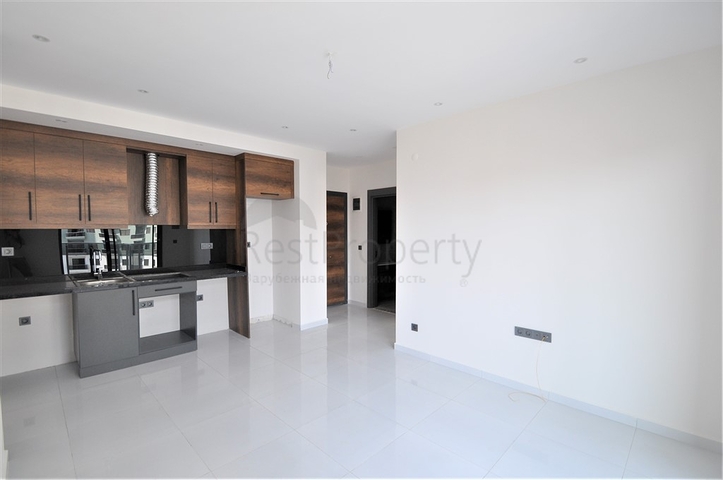 شقة ضمن مجمع بخدمات فاخرة -في الانيا / محمودلار 