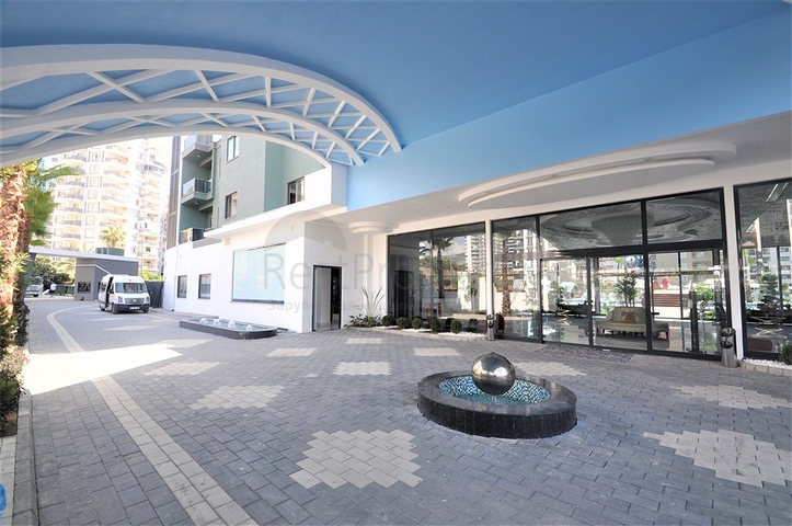 شقة ضمن مجمع بخدمات فاخرة -في الانيا / محمودلار 