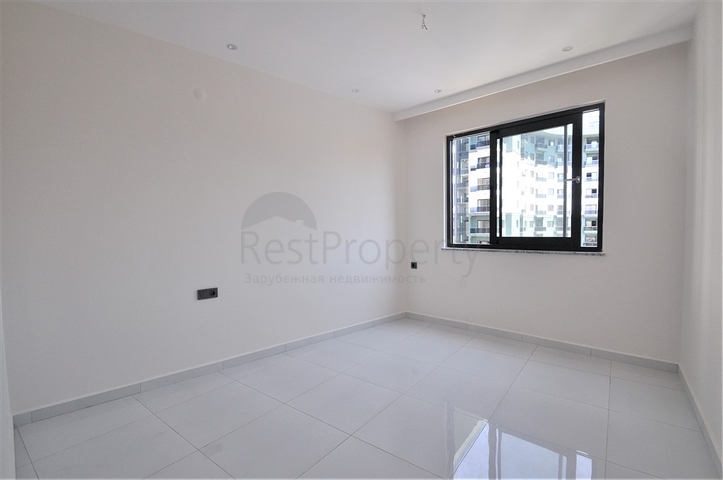 شقة ضمن مجمع بخدمات فاخرة -في الانيا / محمودلار 