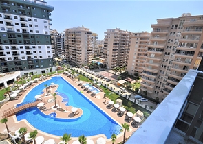 شقة ضمن مجمع بخدمات فاخرة -في الانيا / محمودلار 