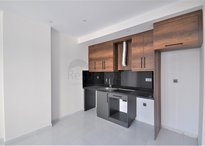 شقة ضمن مجمع بخدمات فاخرة -في الانيا / محمودلار 