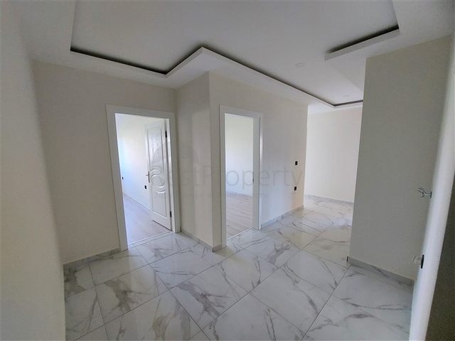 شقة 3 غرف وصالة مع مطبخ منفصل - مجمع سكني جديد -في محمودلار /الانيا 