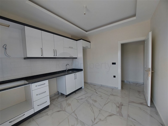 شقة 3 غرف وصالة مع مطبخ منفصل - مجمع سكني جديد -في محمودلار /الانيا 