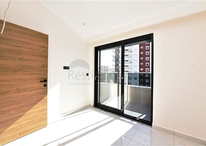 دوبلكس جديدة بسعر مميز -في منطقة  اوبا المركزية -الانيا 