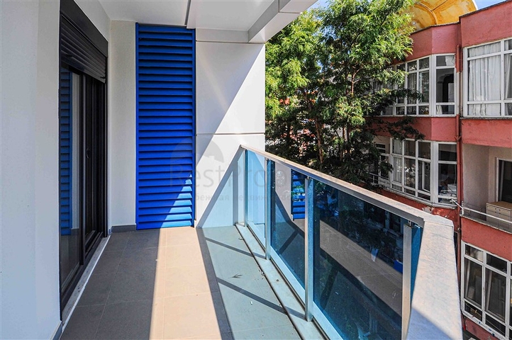 شقة للبيع في اوبا بسعر مناسب - غرفة وصالة ضمن مجمع حديث - قريبة من البحر -اوبا / الانيا 