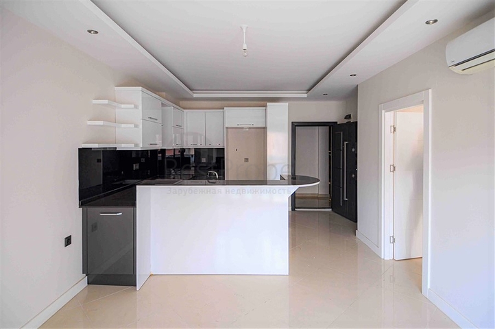 شقة للبيع في اوبا بسعر مناسب - غرفة وصالة ضمن مجمع حديث - قريبة من البحر -اوبا / الانيا 