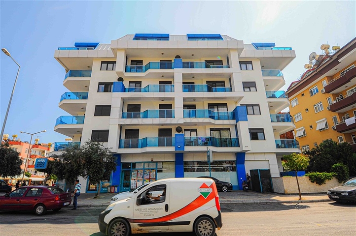 شقة للبيع في اوبا بسعر مناسب - غرفة وصالة ضمن مجمع حديث - قريبة من البحر -اوبا / الانيا 