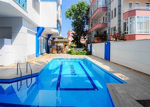 شقة للبيع في اوبا بسعر مناسب - غرفة وصالة ضمن مجمع حديث - قريبة من البحر -اوبا / الانيا 